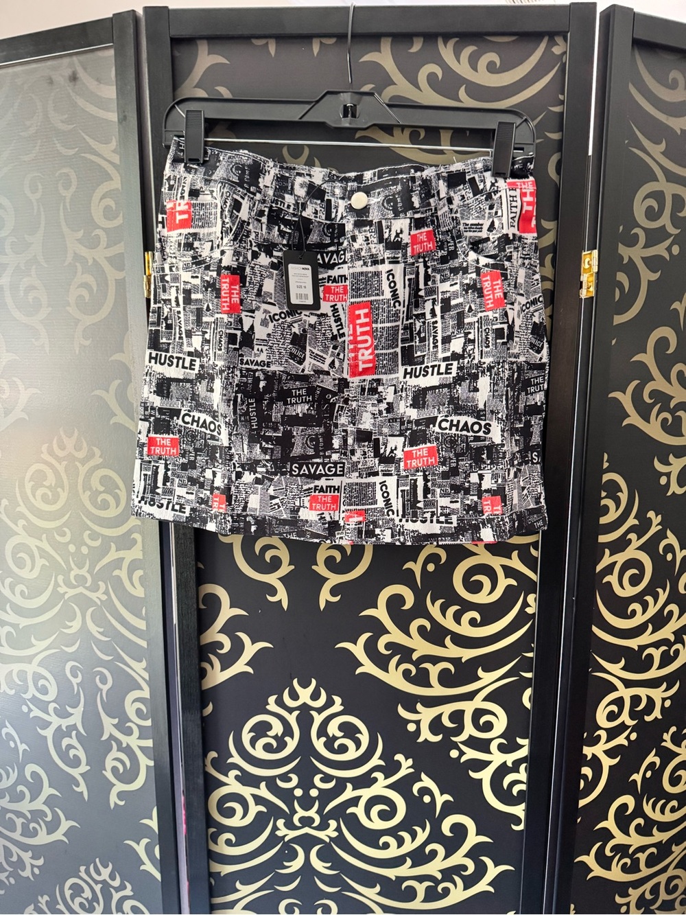 Fashion Nova Black & White Newsprint Mini Skirt with Red Accents